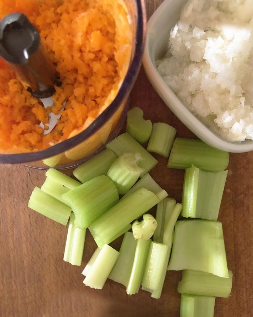 celery, carrot into a blender and chopped onions