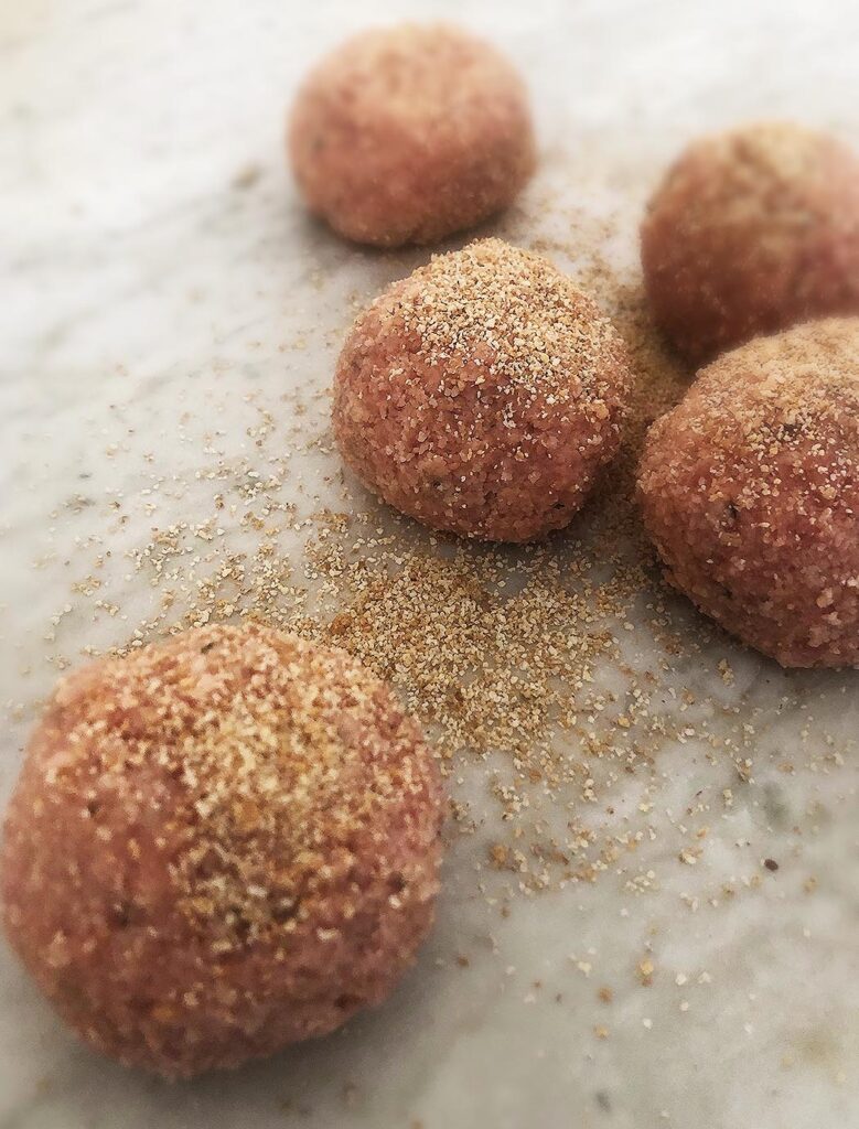 polpette meatballs on a white marble surface