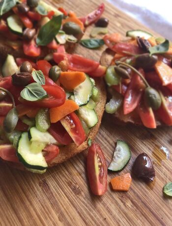 frisella bread seasoned with vegetables: cucumber, onion, tomatoes, celery