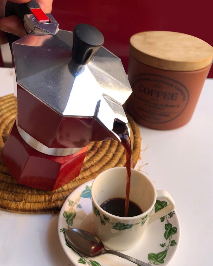 pouring coffee into a coffee cup