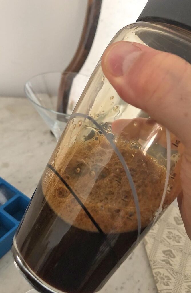 coffee in the shaker to prepare shaken coffee