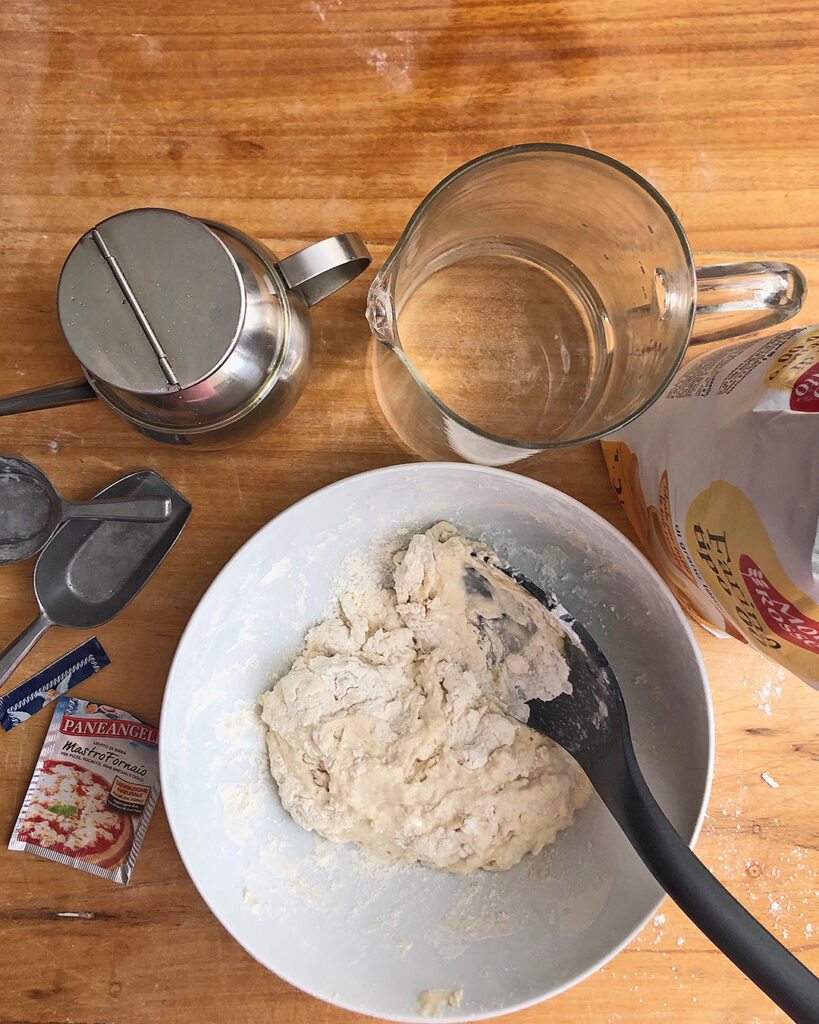 making pizza dough in a pan