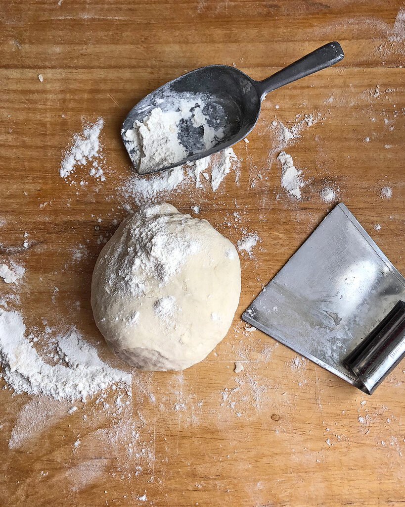 pizza dough ready on the board