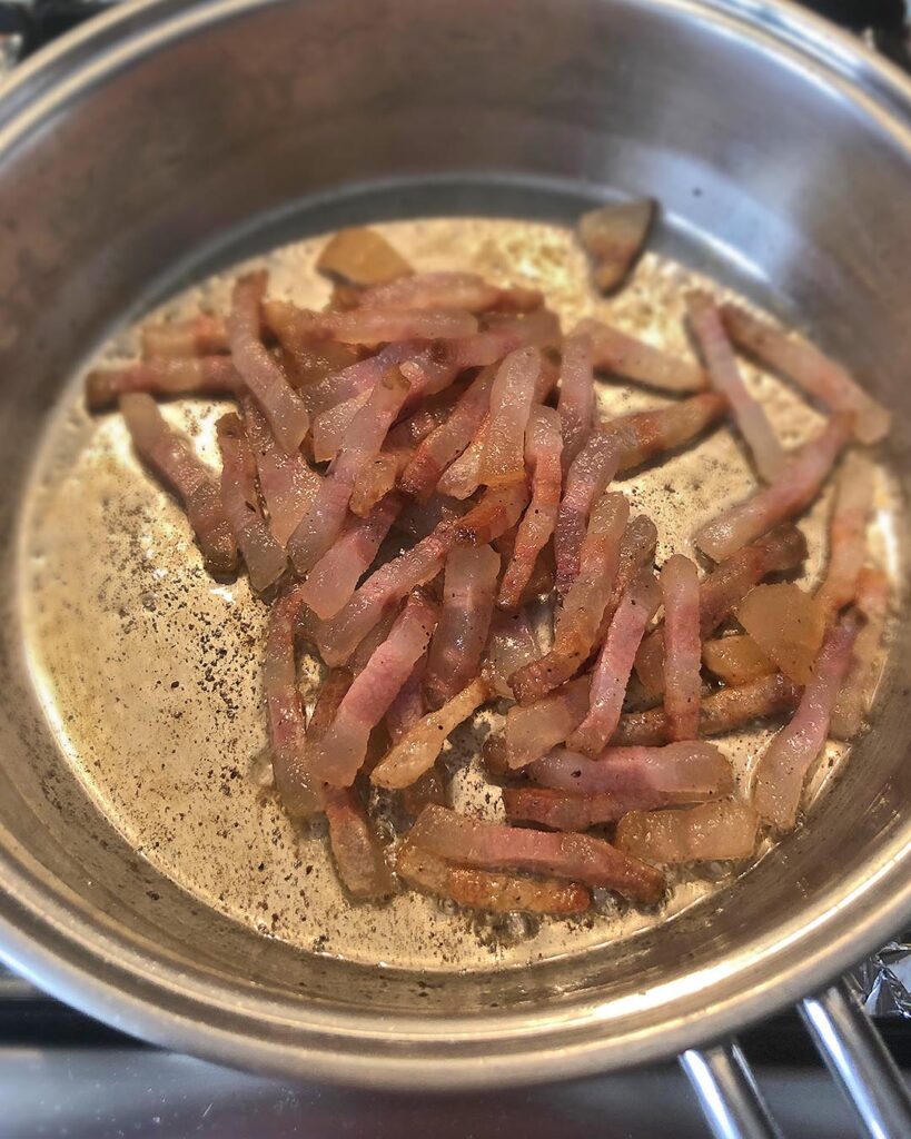 pork sticks cooked into a pan