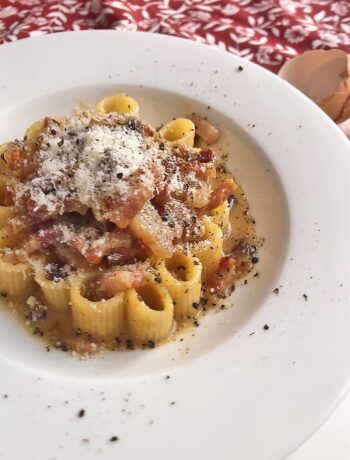 pasta alla carbonara served on a white dish