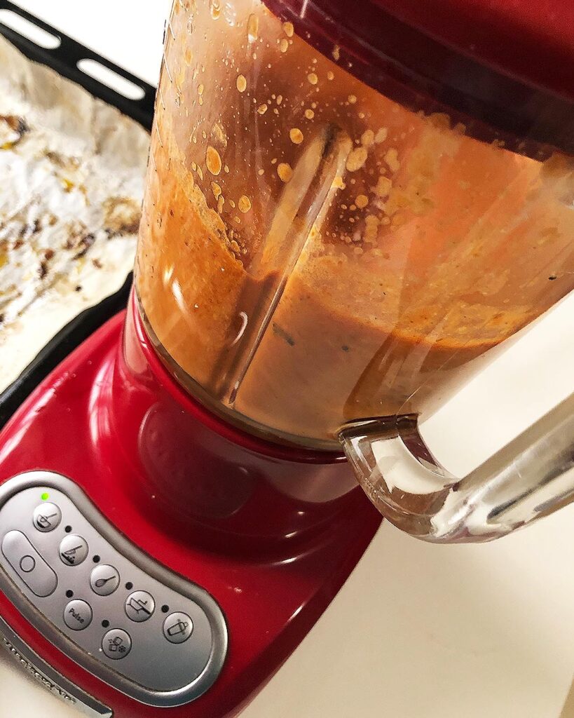 blending roasted tomatoes and mozzarella