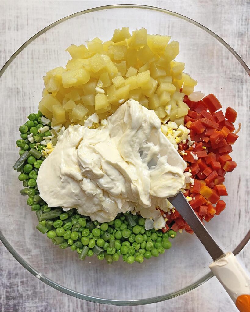 mixing together all the ingredients
