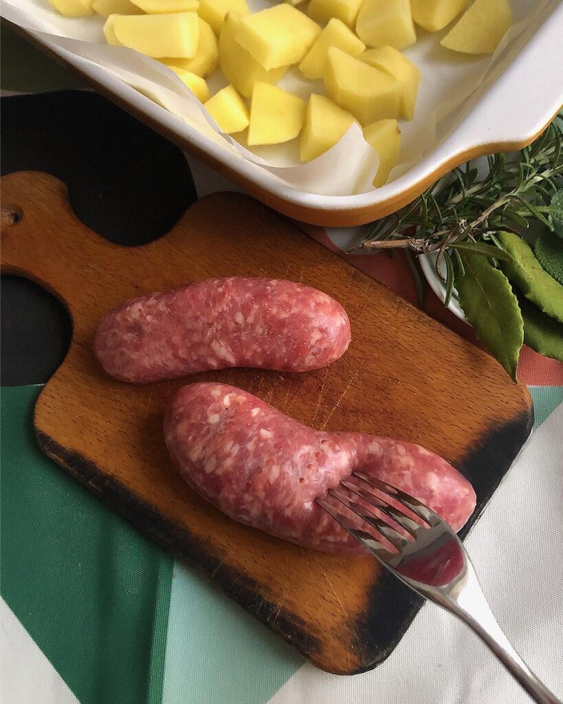 piercing sausages with a fork before to cook