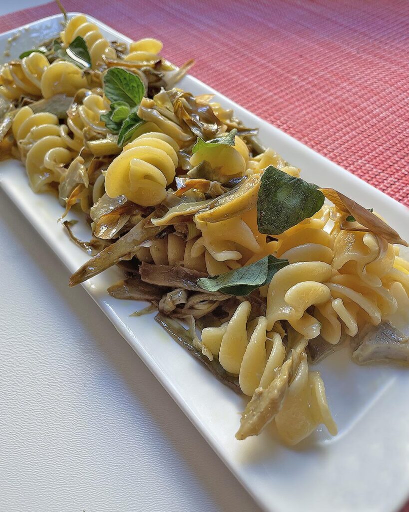 close up of artichoke pasta