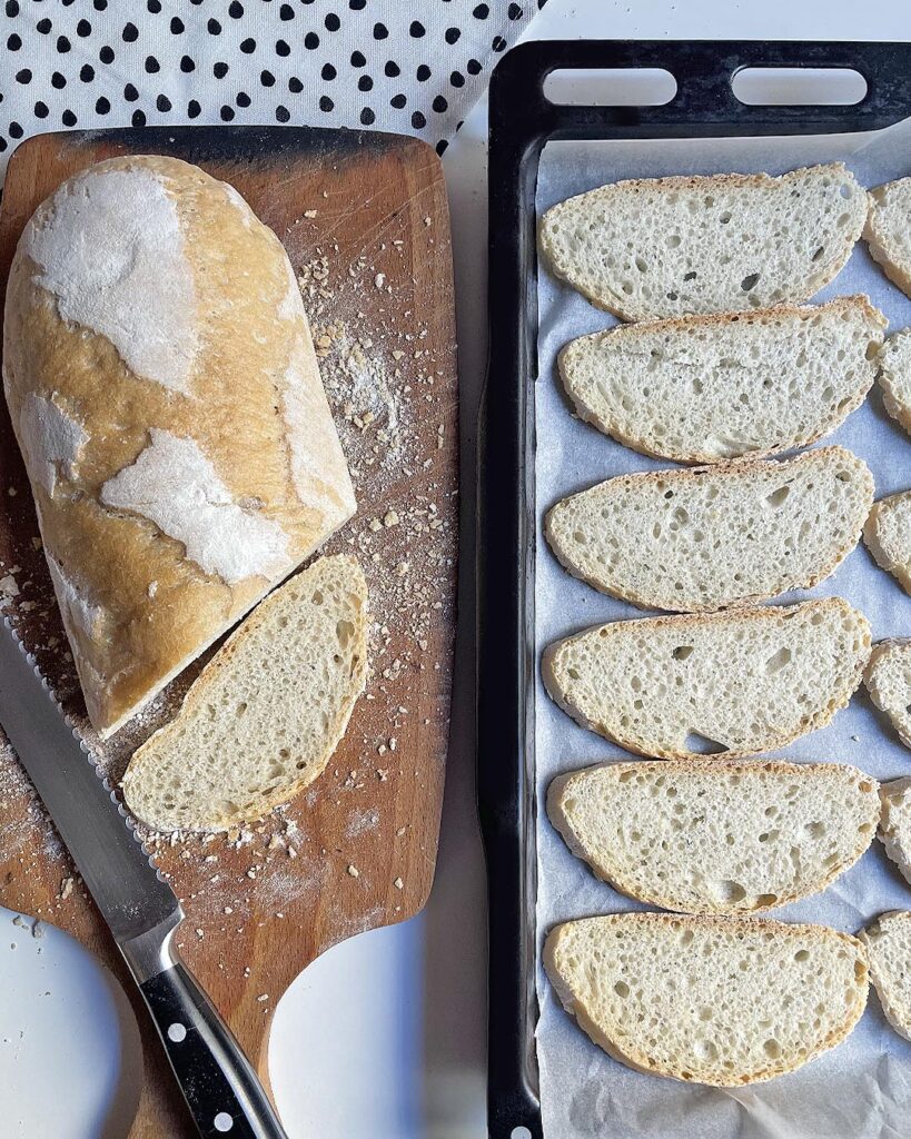 tiny slices of bread are toasted in the oven