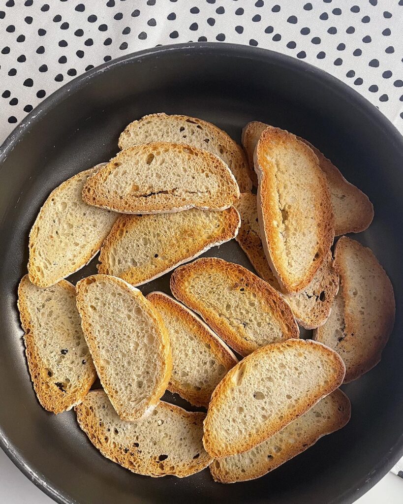 a first layer of bread in the skillet