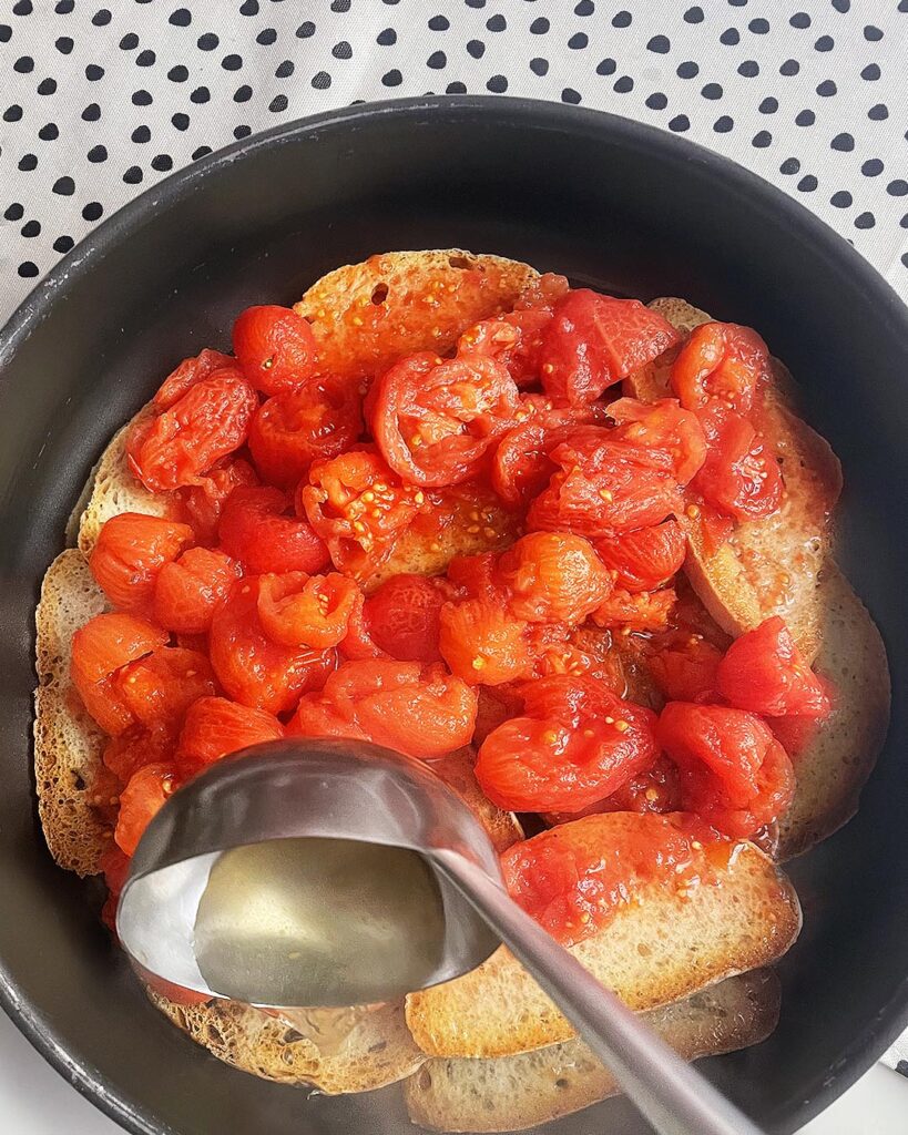 a second layer of tomatoes in the skillet