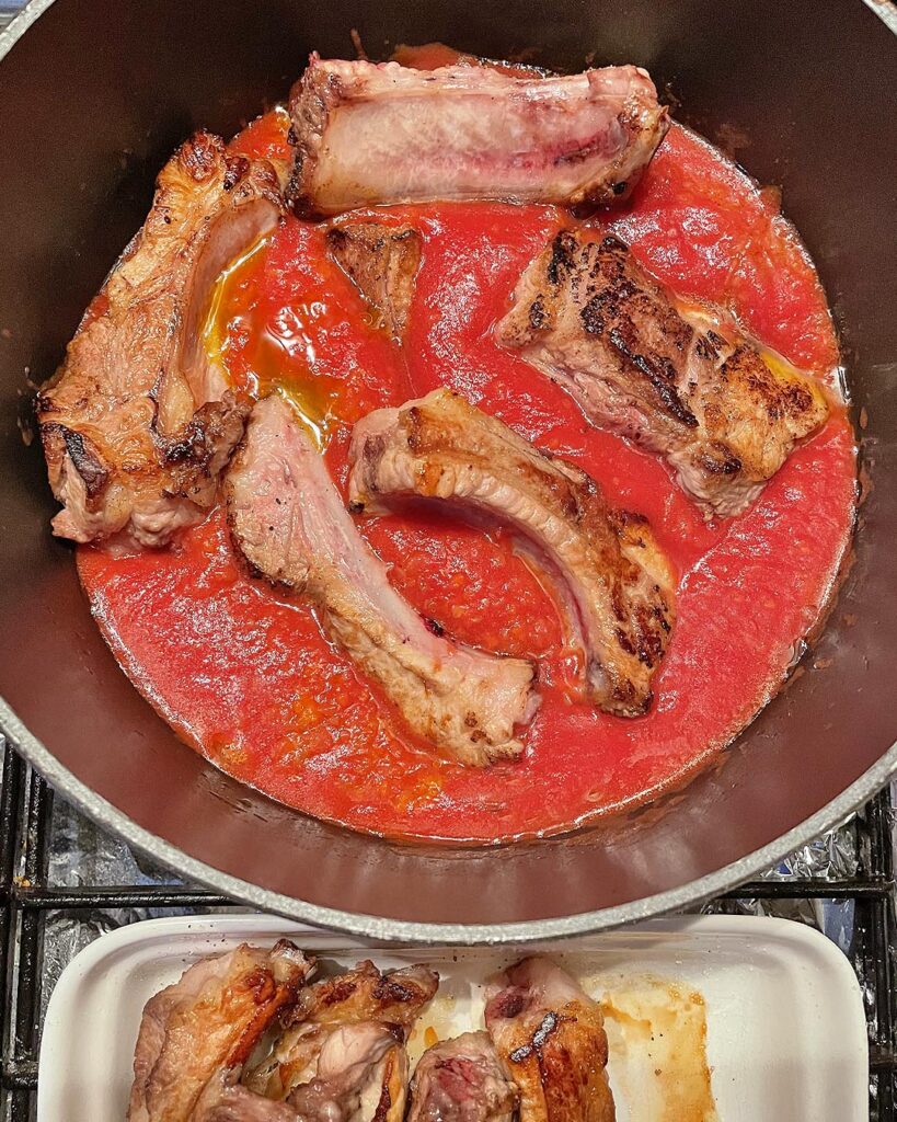ribs are added to the tomato sauce