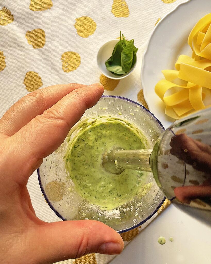 blending pesto