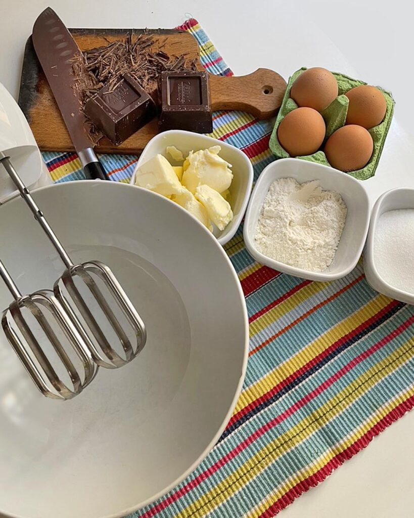 ingredients for tenerina chocolate cake: chocolate, butter, sugar, flour, eggs