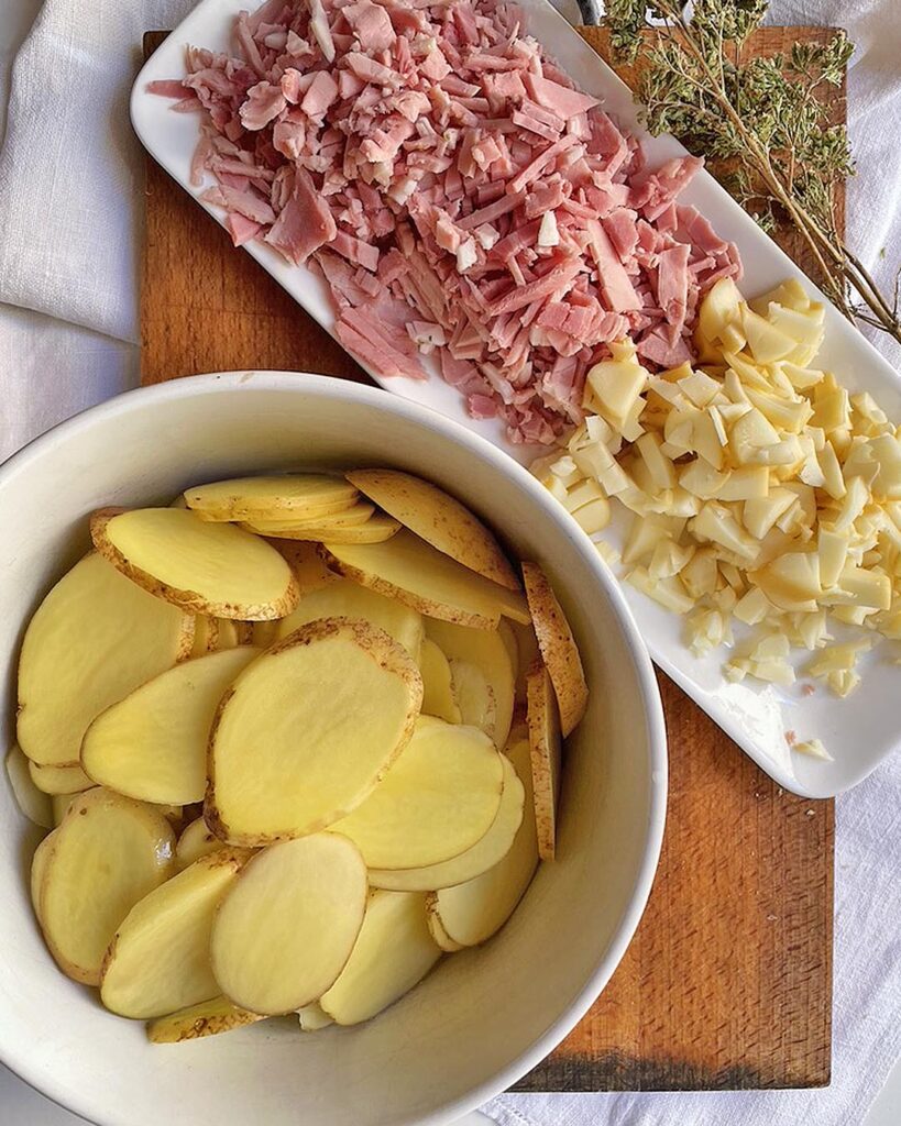 sliced potato, ham and scamorza cheese minced