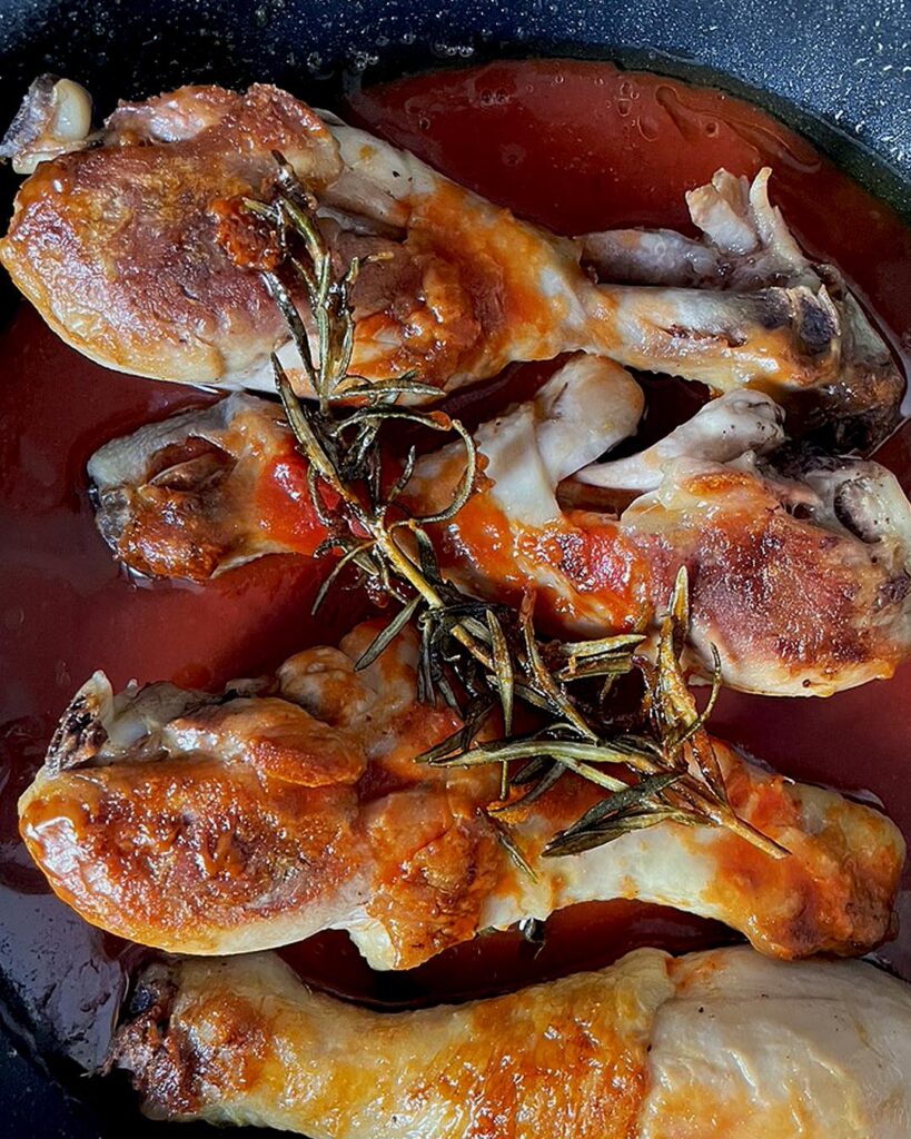 tomato sauce added to the chicken
