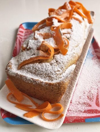 carrot & orange cake cooked served on a white dish