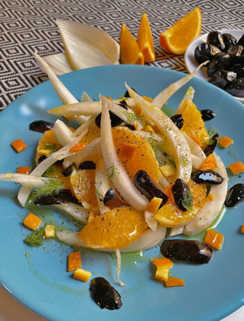 fennel and orange salad served on a blue dish