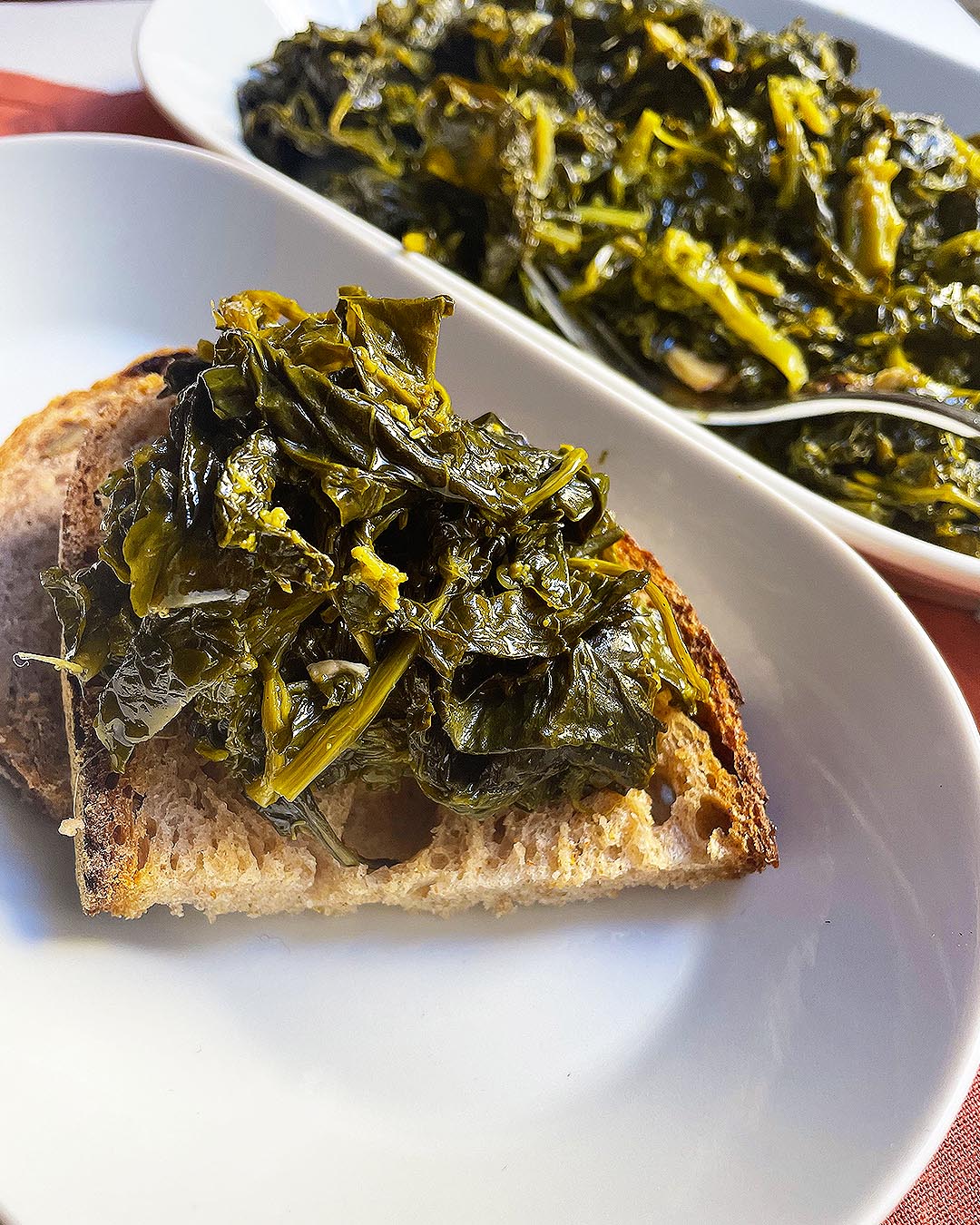turnip green on a slice of bread